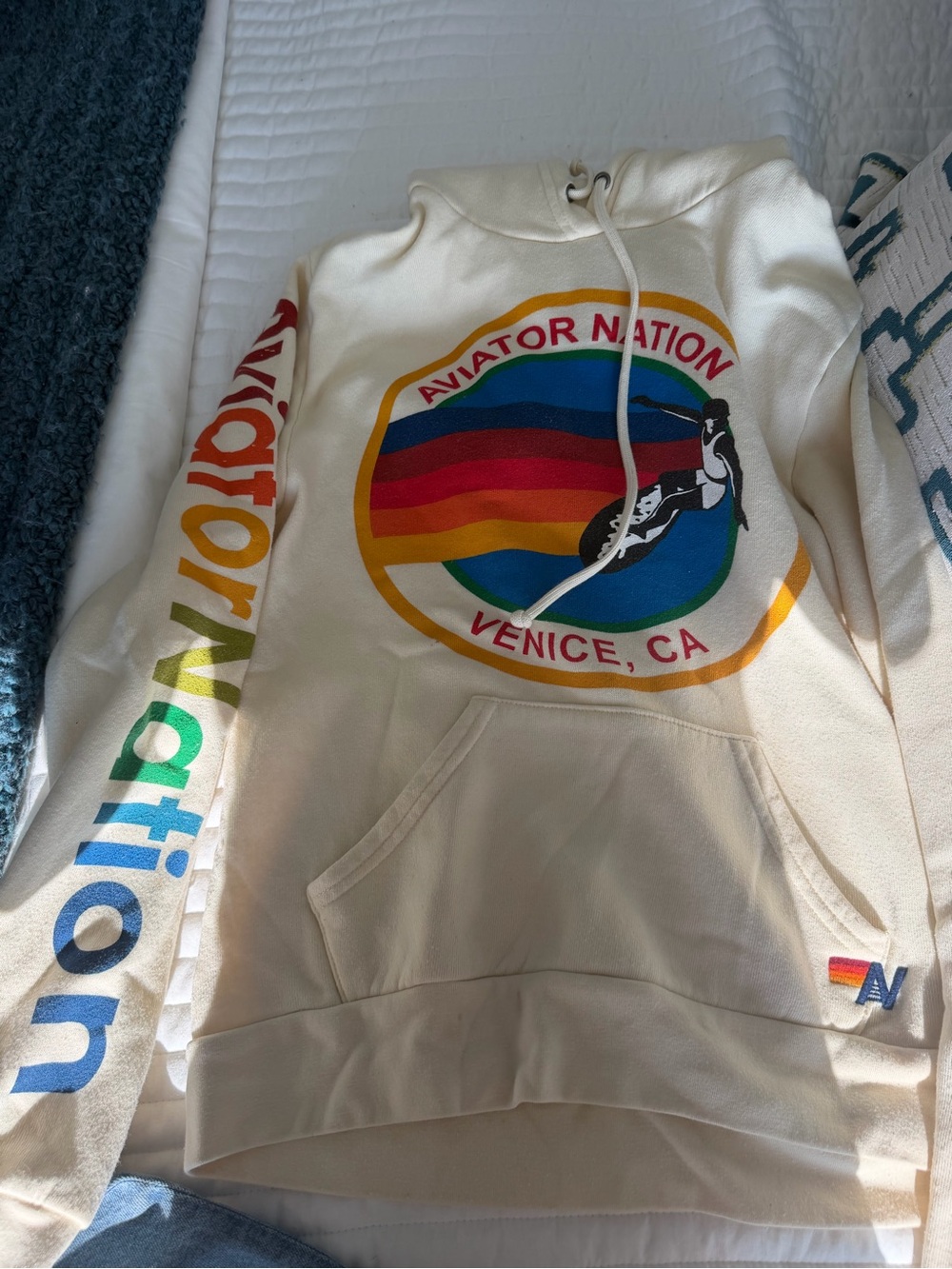 Aviator Nation Cream Hoodie with Multicolor Rainbow Logo and sweatpants